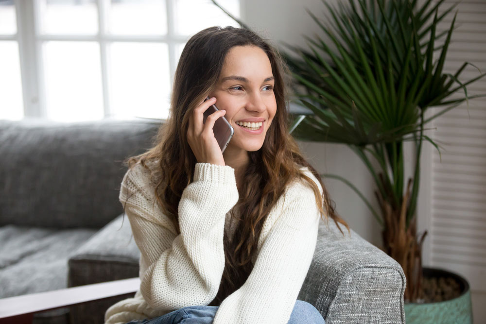 Lady Utilizing Interactive voice response